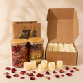 Romantic Ritual Bath Kit with botanical bath tea jars, rose petals, kraft gift packaging, and battery-operated LED candles.